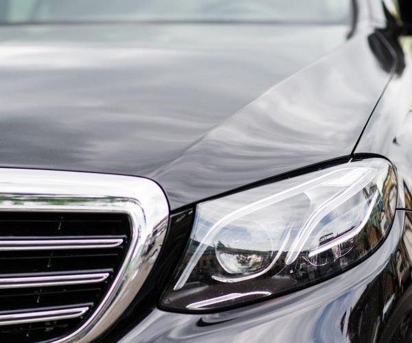 Headlights of black modern car